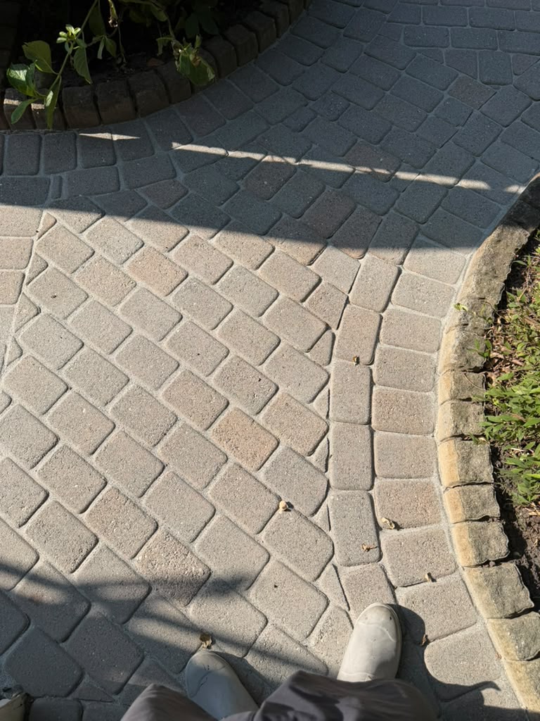 Detailed close up of restored herringbone pavers