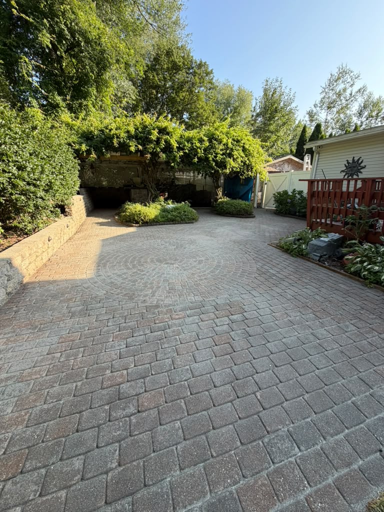 Large paver driveway and patio after pressure washing